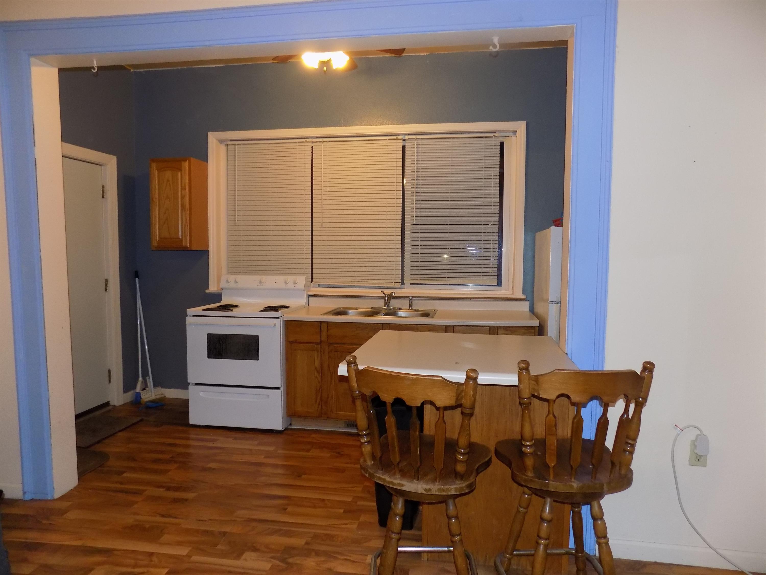 310 W. Louis Glick- 5